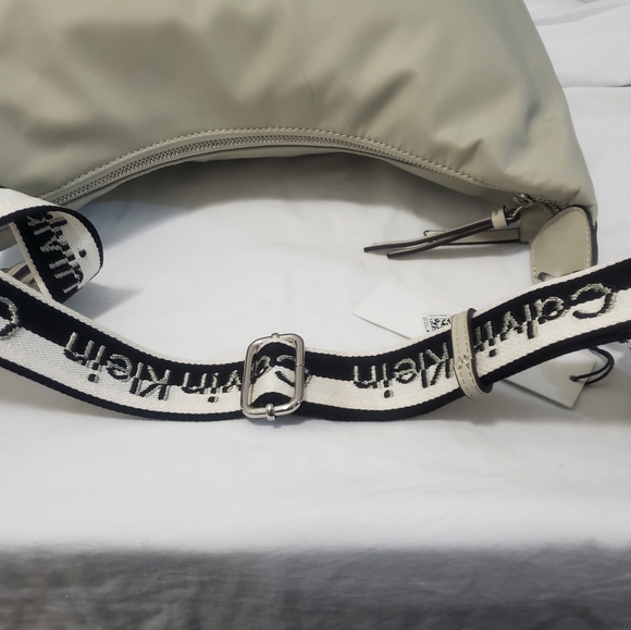 Calvin Klein Saddie Large Crossbody - Picture 8 of 10